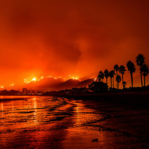 Wildfires burning near a California shoreline