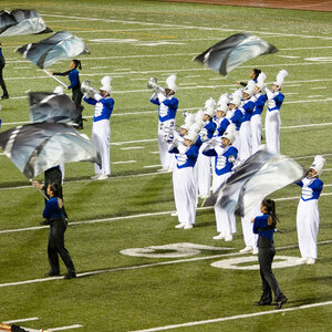 Maui High School marching band performing on the school football field. Maui High School marching band performing on the school football field.