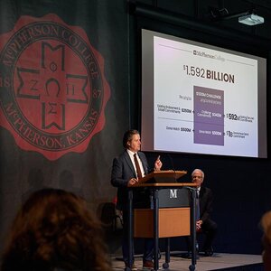 McPherson College president Michael Schneider addressing a crowd. McPherson College president Michael Schneider addressing a crowd.