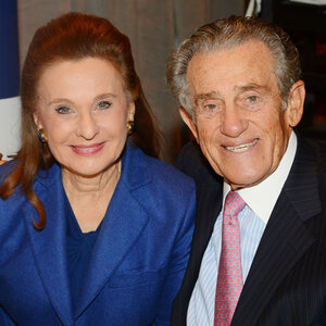 An older wife and husband pose for a photo - Renée and Robert Belfer. An older wife and husband pose for a photo - Renée and Robert Belfer.