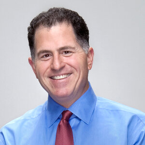 A smiling businessman in a shirt and tie poses for a headshot – a photo of Michael Dell. A smiling businessman in a shirt and tie poses for a headshot – a photo of Michael Dell.