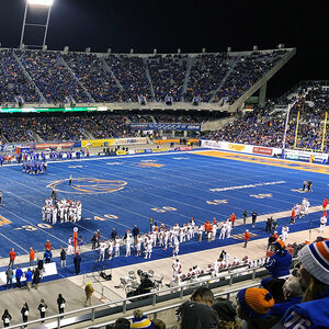 A football game in a stadium.