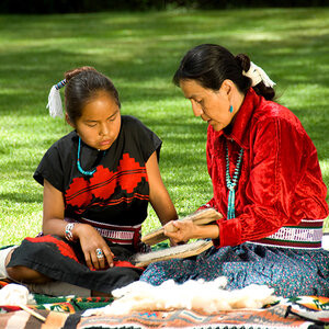 An Indigenous girl and her mother. An Indigenous girl and her mother.