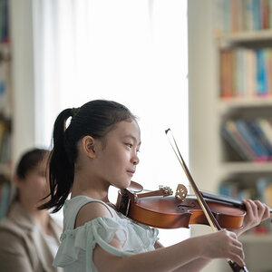 A child playing the violin.