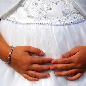 Young girl in a wedding dress.