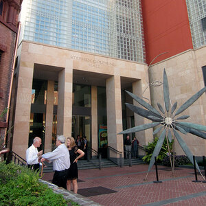 The glass and stone facade of an art museum. The glass and stone facade of an art museum.