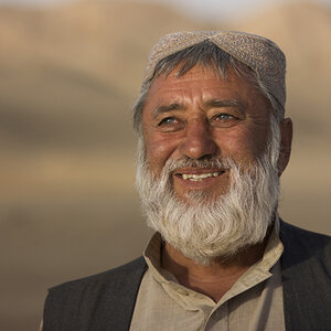 A smiling Afghan man; not one of the fellows.