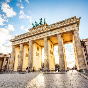A sunlit image of the Brandenburg Gate in Berlin, Germany