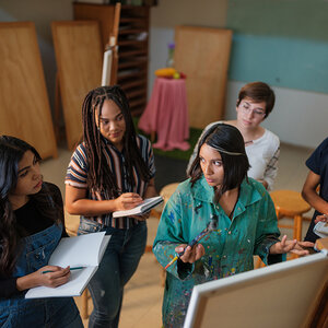 A group of artists working together. A group of artists working together.