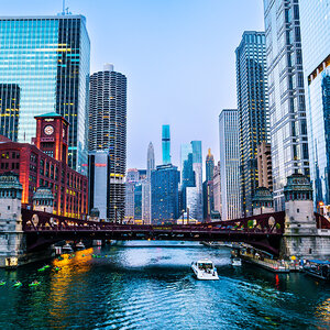 The Chicago Riverwalk and skyscrapers in the background.