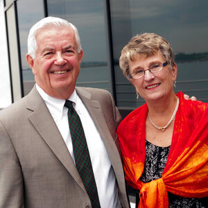 An older husband and wife pose for a photo – Bill and Joyce Cummings. An older husband and wife pose for a photo – Bill and Joyce Cummings.