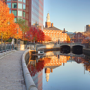 Buildings relfecting on a canal from Waterfront Park in Providence, Rhode Island. Buildings relfecting on a canal from Waterfront Park in Providence, Rhode Island.