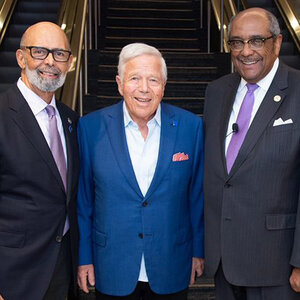 Three men in suits pose for a photo – Michael L. Lomax, Robert Kraft, and Milton H. Jones, Jr. Three men in suits pose for a photo – Michael L. Lomax, Robert Kraft, and Milton H. Jones, Jr.