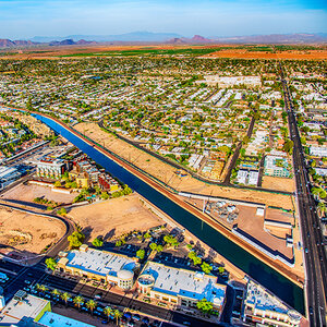 An aerial view of a waterway in the suburban Phoenix area.