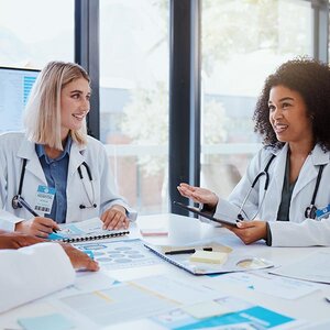 Health experts discussing health data.