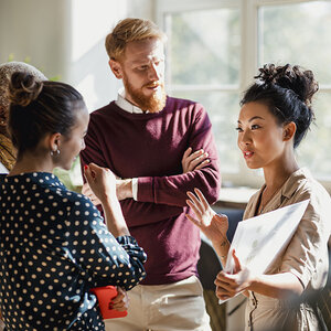A group of people working together. A group of people working together.
