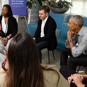 former President Barack Obama (right) sits with donor Brian Chesky (middle) and others involved with the Voyager Scholarship program former President Barack Obama (right) sits with donor Brian Chesky (middle) and others involved with the Voyager Scholarship program