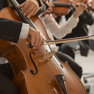 An orchestra playing music. An orchestra playing music.