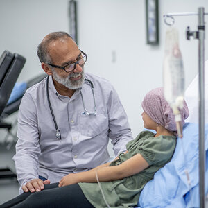 A child in a hospital receiving cancer treatment.