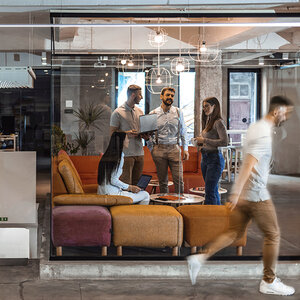 People working in a busy office.