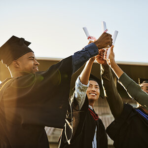 College students celebrating their graduation.