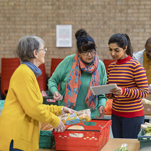 Community organizers putting together a food drive.