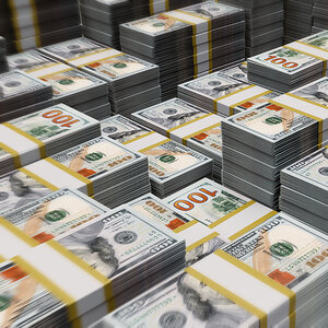 A large stack of bundled one-hundred-dollar bills.