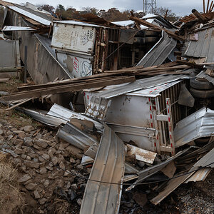 An image of upturned trucks and damaged buildings in the aftermath of Hurricane Helene. An image of upturned trucks and damaged buildings in the aftermath of Hurricane Helene.