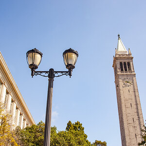 A Victorian lamppost and a brick clock tower.