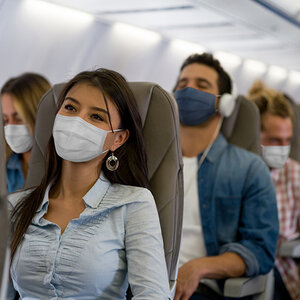 People wearing masks to reduce their likelihood of contracting an airborne disease People wearing masks to reduce their likelihood of contracting an airborne disease
