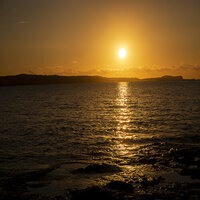 A sunset over the ocean. A sunset over the ocean.