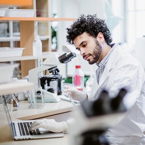 A pharmacy student in the lab. A pharmacy student in the lab.