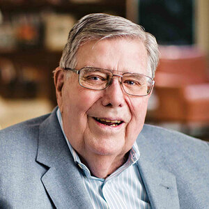 An older man wearing glasses and a grey sport jacket – a photo of Richard Holland.