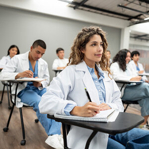 A group of medical students in class. A group of medical students in class.