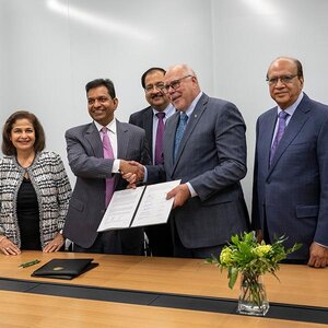 Representatives from UNT and the Guptas. Representatives from UNT and the Guptas.