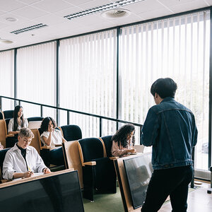 A university lecture in progress. A university lecture in progress.