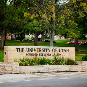 A sign reading "University of Utah' at the campus entrance.