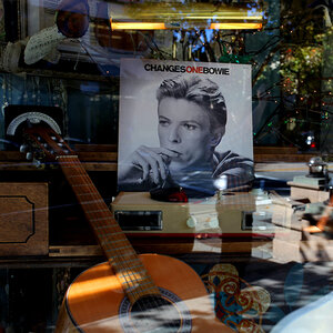 A David Bowie record in a shop window.