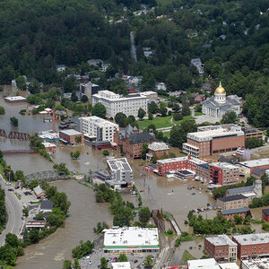 An aerial view of a flooded city - Montpelier, Vermont. An aerial view of a flooded city - Montpelier, Vermont.