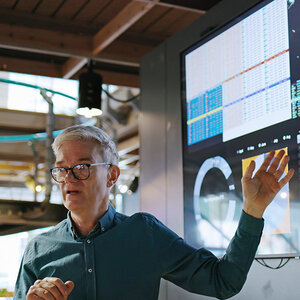 A professor leading a class.