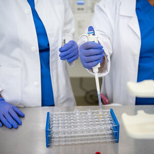 Researchers conducting vaccine trials.