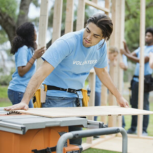 Volunteers building a home.