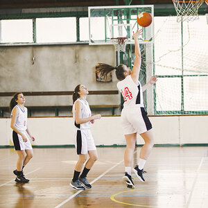 Women playing basketball. Women playing basketball.