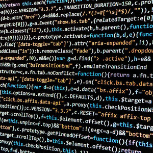A computer screen filled with multicolored computer code.